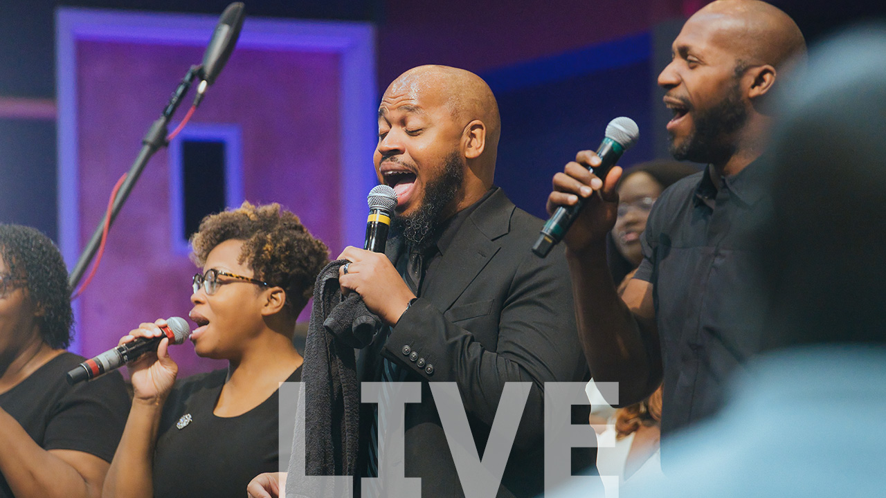 Worship team singing during a live service